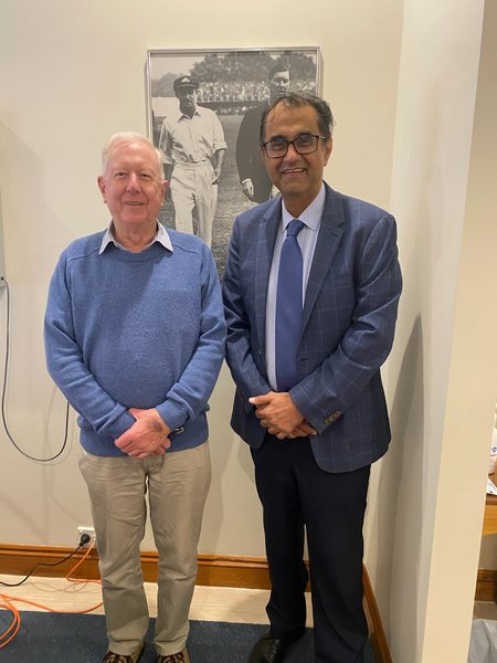 Office photograph with Dr Raji Kooner linked to a robotic surgery milestone