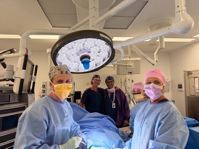 The Urology NSW operating-theatre team under theatre lights